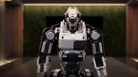 A robot standing in a green room during the trailer for Call of Duty: Black Ops 7.