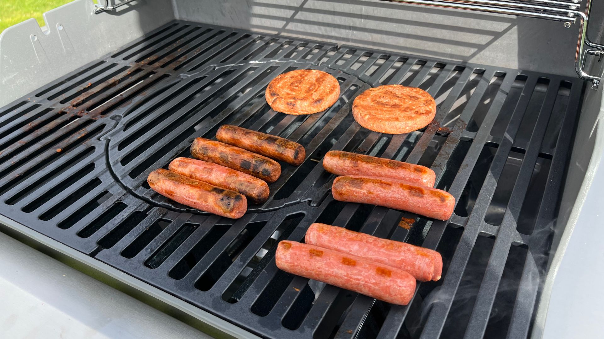 Burgers and hot dogs on the Weber Spirit II E-310