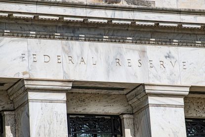 A closeup of the outside of the Federal Reserve building