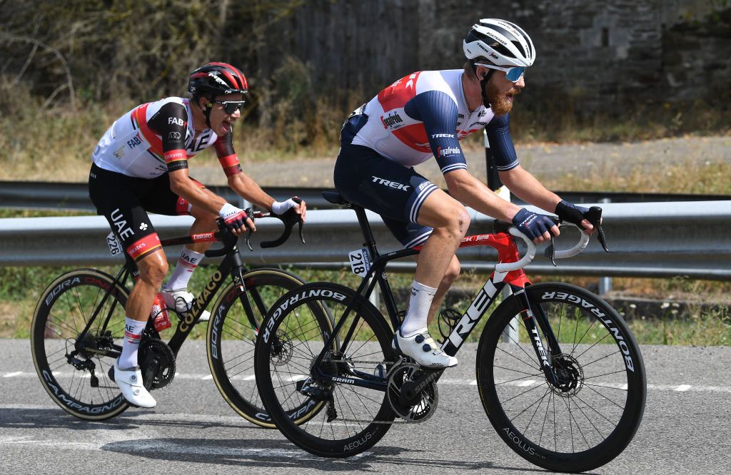 MONFORTE DE LEMOS SPAIN SEPTEMBER 03 LR Rui Oliveira of Portugal and UAE Team Emirates and Quinn Simmons of United States and Team Trek Segafredo compete in the breakaway during the 76th Tour of Spain 2021 Stage 19 a 1912 km stage from Tapia to Monforte de Lemos lavuelta LaVuelta21 on September 03 2021 in Monforte de Lemos Spain Photo by Tim de WaeleGetty Images