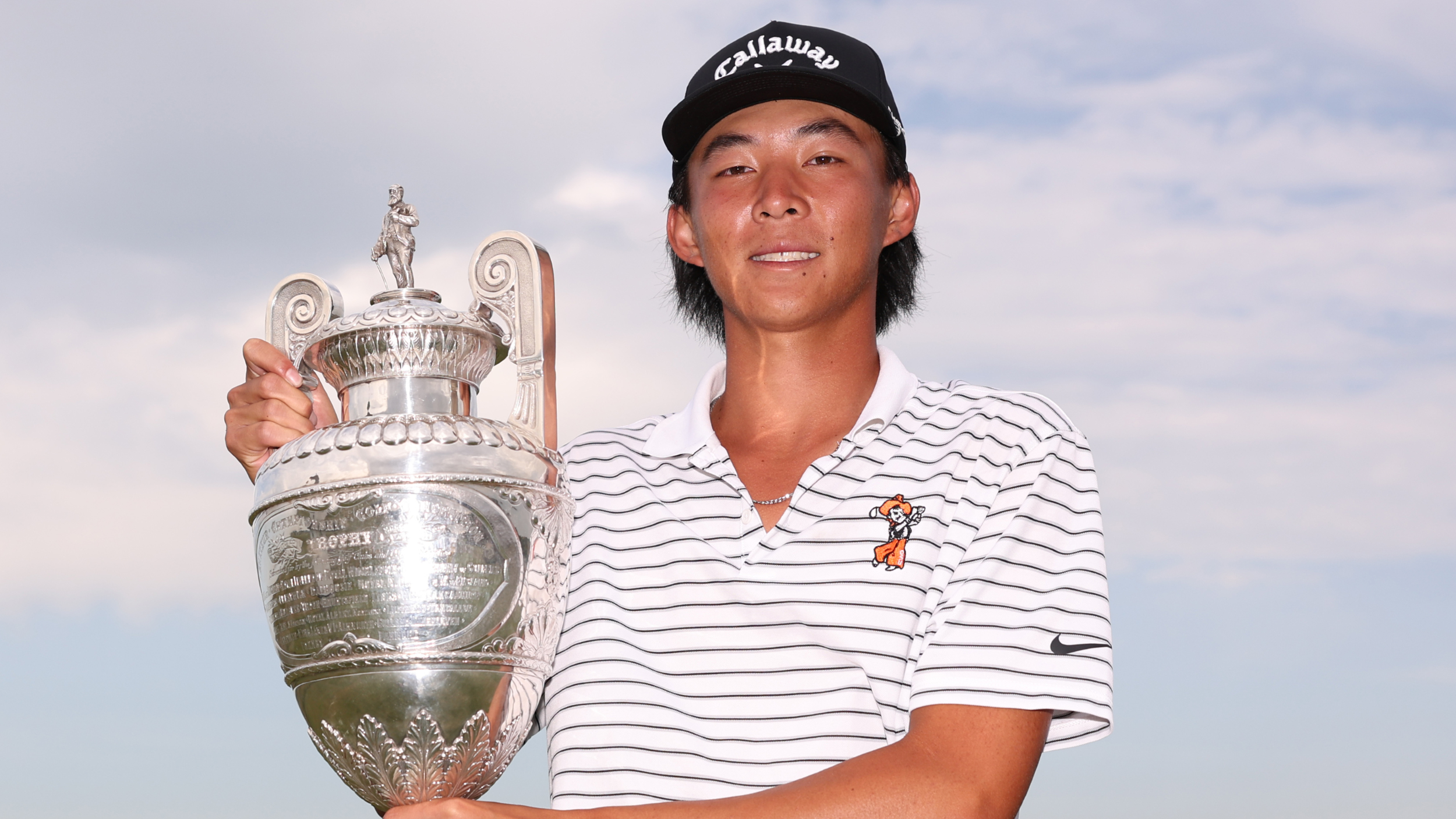 Ethan Fang with The Amateur trophy