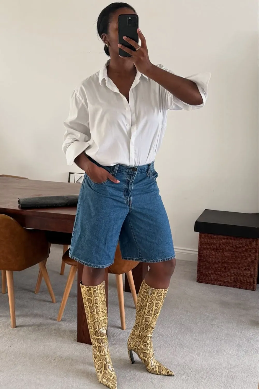 marilyn nwawulor kazemaks wears snake print boots and jorts