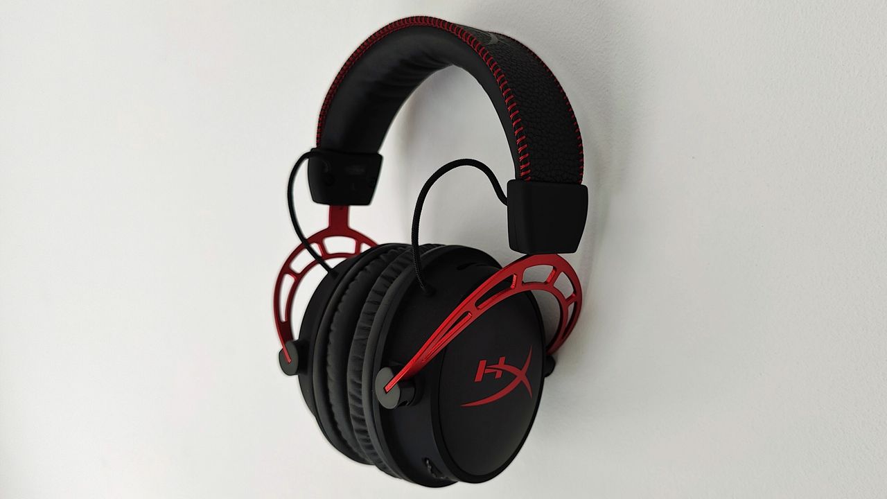 HyperX Cloud Alpha Wireless review: headphones on a white wall