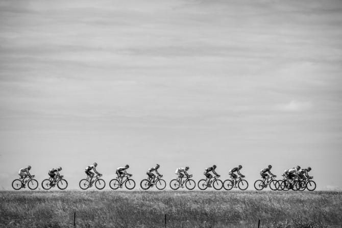 The breakaway group gets strung out as the lead increases.