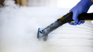 A mattress being stem cleaned to get rid of dust bites and bed bugs