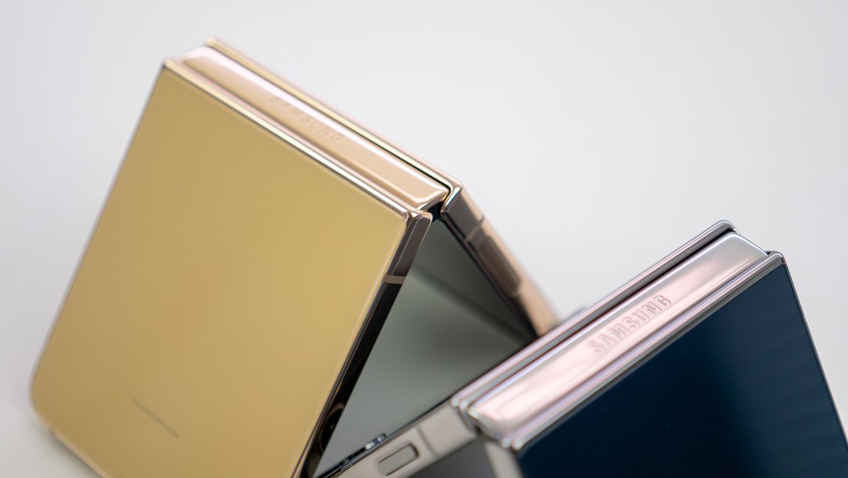 Samsung Galaxy Z Flip 4 Bespoke Edition, one with yellow backplates with gold frame and the other with Navy backplates and a silver frame