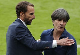 England manager Gareth Southgate, left, with Germany counterpart Joachim Low