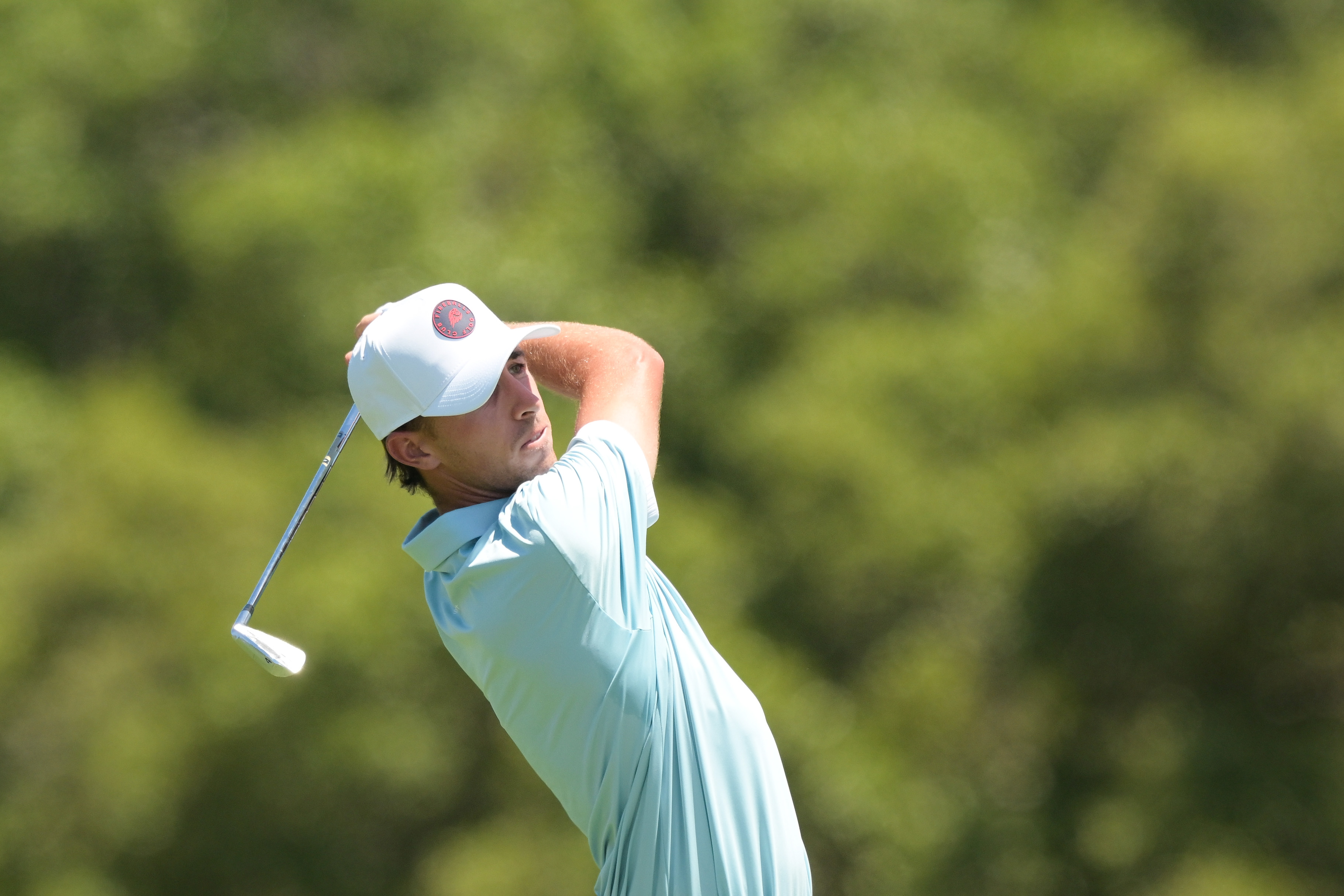 David Puig hits an iron