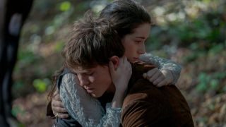 Emma Canning holds Milo Callaghan in a moment of vulnerability in the woods in Dune: Prophecy S1 E3 - "Sisterhood Above All."