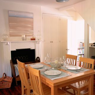dining room with table and fire place
