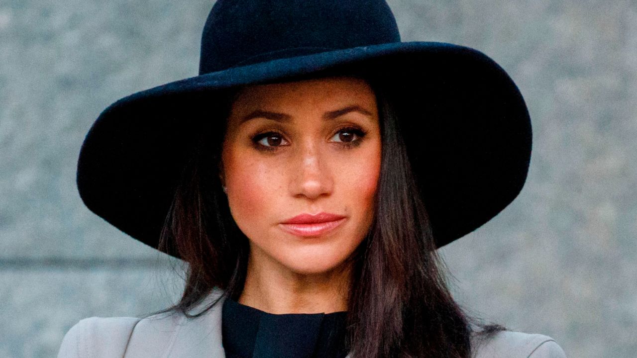 Meghan Markle, the US fiancee of Britain&#039;s Prince Harry, attends an Anzac Day dawn service at Hyde Park Corner in London on April 25, 2018.