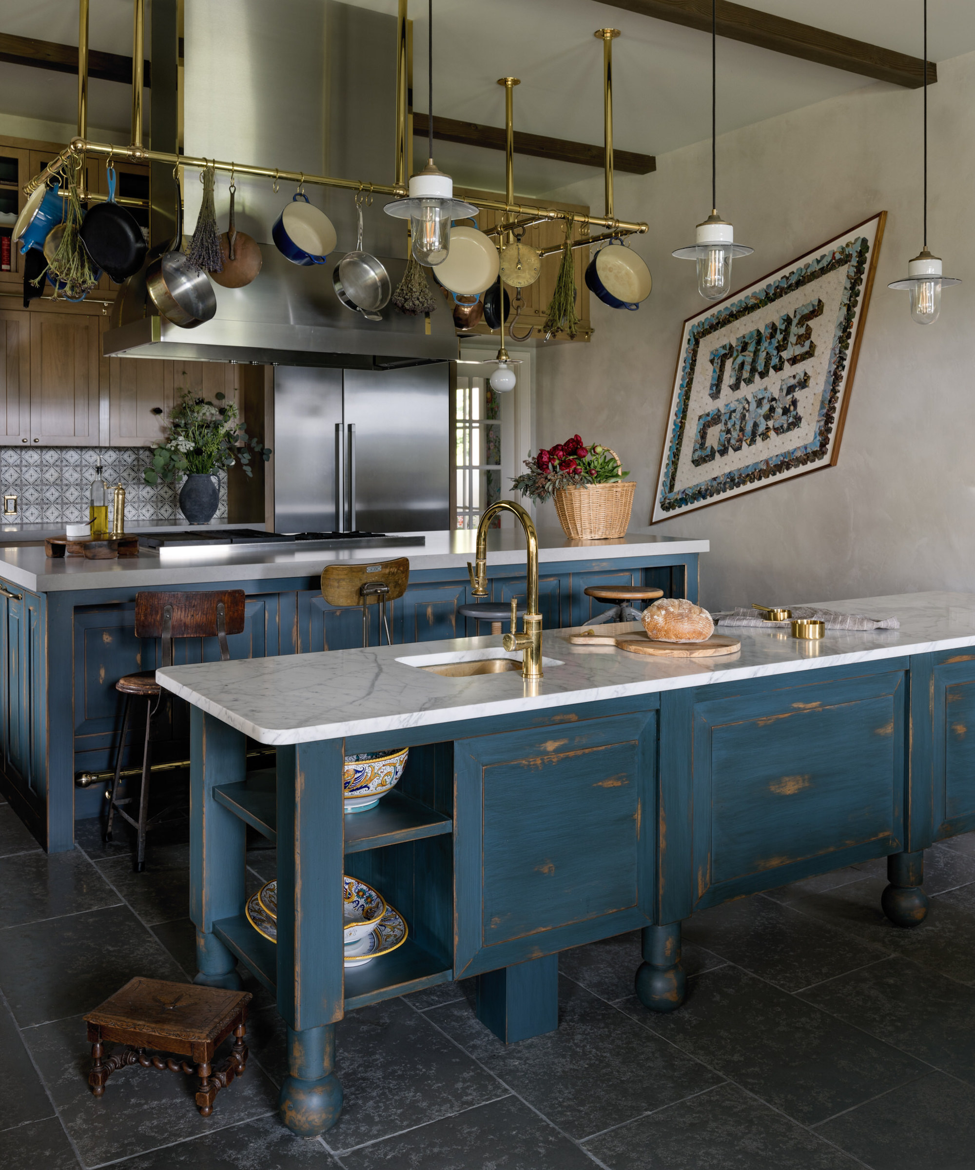 kitchen with two blue islands