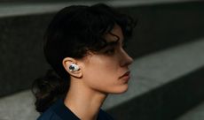 Sennheiser's Momentum True Wireless 3 earbuds being worn by a woman
