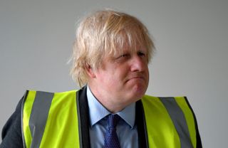 LONDON, ENGLAND - JUNE 29: Britain's Prime Minister, Boris Johnson visits a science room under construction at Ealing Fields High School on June 29, 2020 in west London, England. The Prime Mi