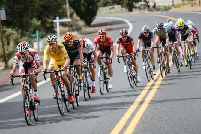 Whats left of the peloton chases the front group
