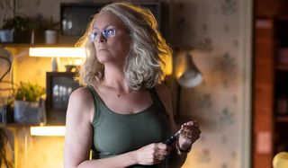 Jamie Lee Curtis Laurie Strode sharpens a knife Halloween 2018