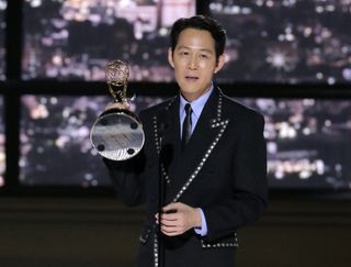 Lee Jung-jae accepts the Outstanding Lead Actor in a Drama Series for "Squid Game" on stage during the 74th Annual Primetime Emmy Awards held at the Microsoft Theater on September 12, 2022