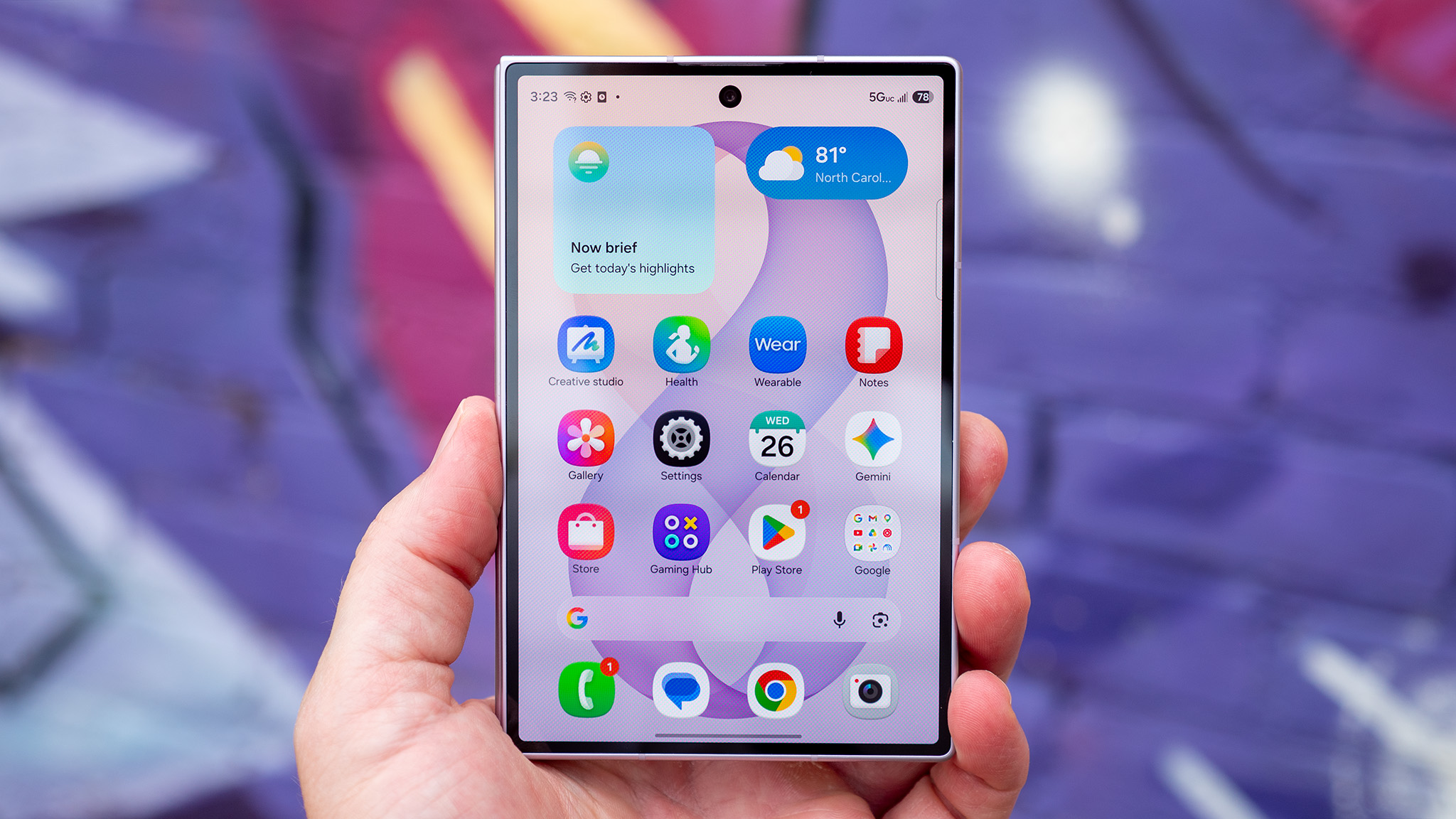 Holding a Samsung Galaxy Z Fold 8