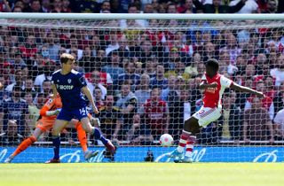 Eddie Nketiah, right, scores his second goal of the game in Arsenal's 2-1 win against Leeds