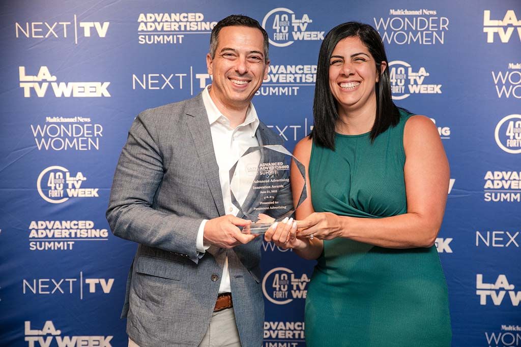 Steve Montana and Michele Stone of Paramount Advertising accept the Advanced Advertising Innovation Award on behalf Paramount&rsquo;s Vantage.