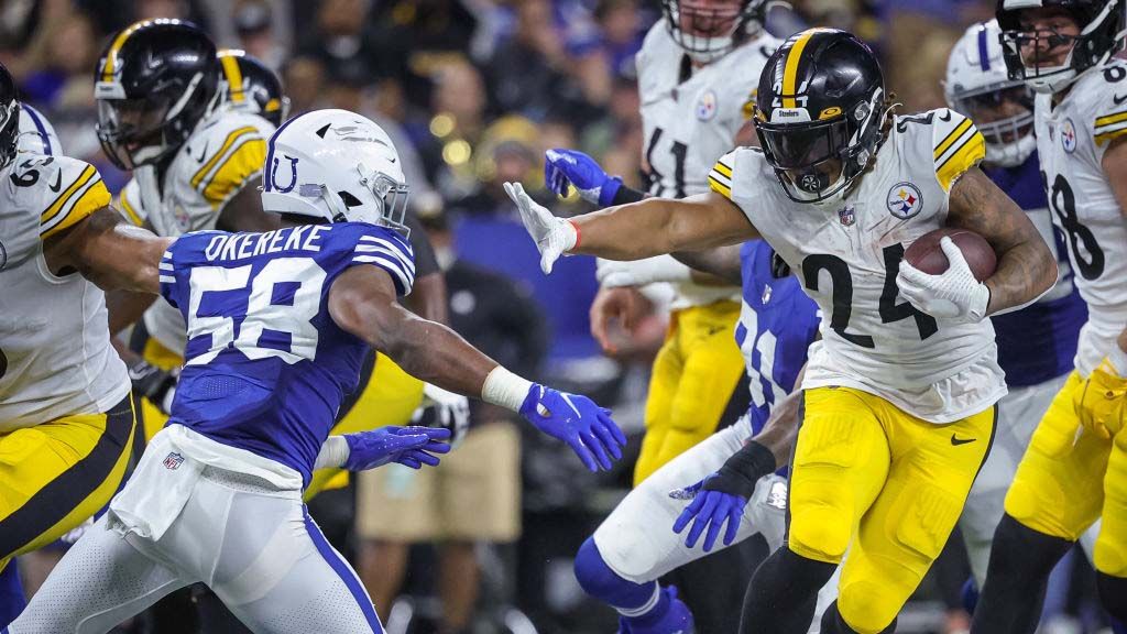 Benny Snell Jr. #24 of the Pittsburgh Steelers runs the ball against Bobby Okereke #58 of the Indianapolis Colts at Lucas Oil Stadium on November 28, 2022 in Indianapolis, Indiana. 