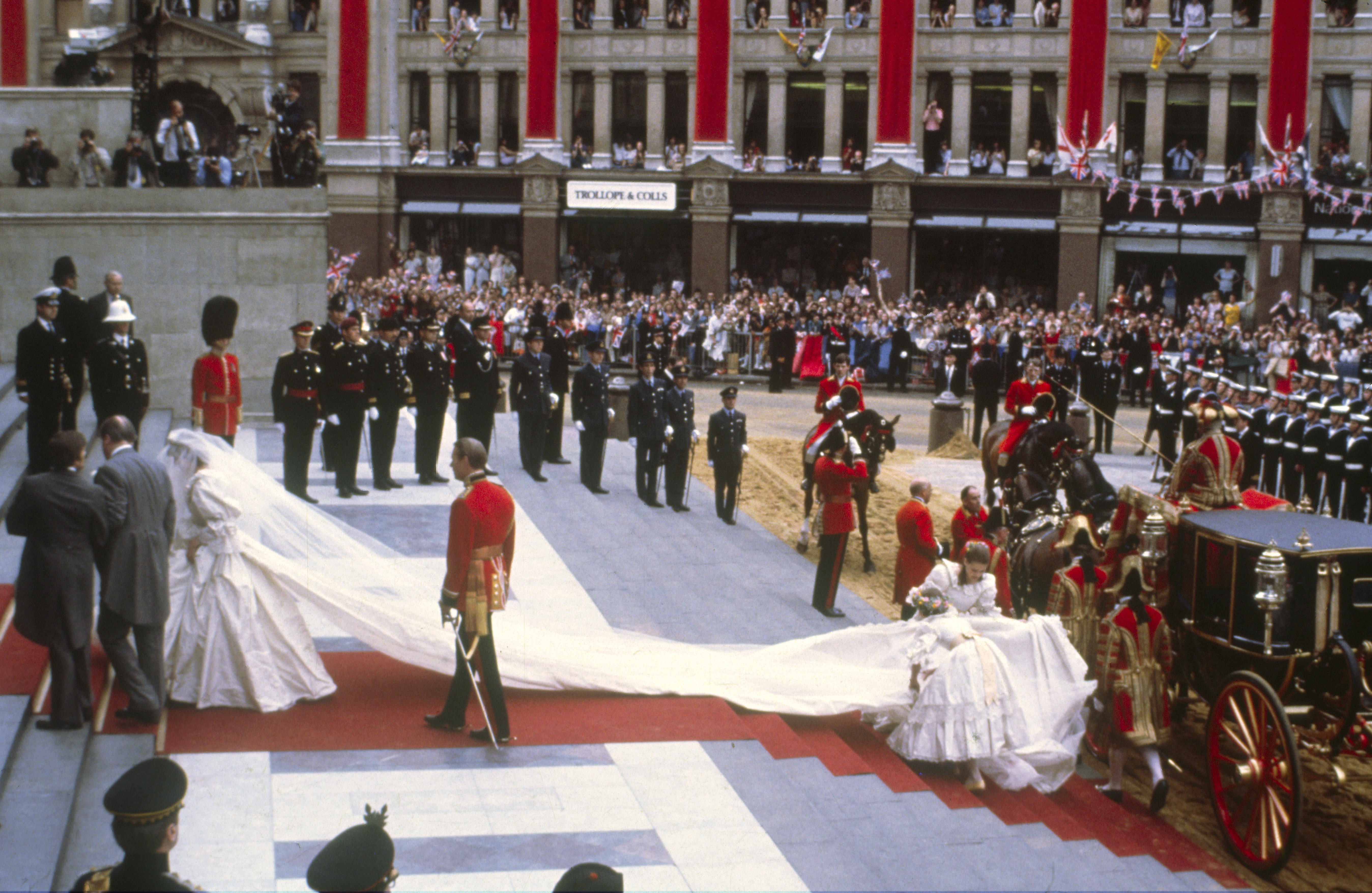 Princess Diana walking up the stairs of St Paul's Cathedral on her wedding day