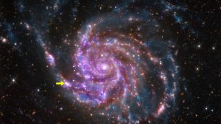 a purple spiral galaxy with a bright star alone one arm