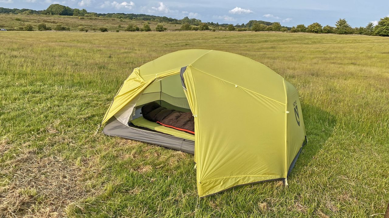Nemo Dagger Osmo tent pitched in a field with the door open 