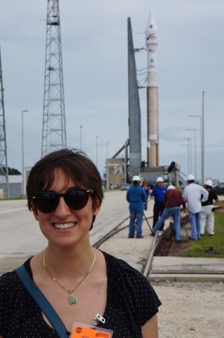 SPACE.com reporter Miriam Kramer stands in front of the Atlas 5 rocket housing the MAVEN probe on the launch pad in Florida. Photo released Nov. 16, 2013.
