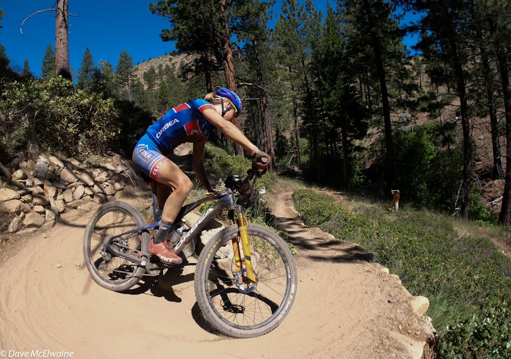 Maghalie Rochette (Clif Pro Team) rounding a switchback after crashing in the dirt of the previous one.