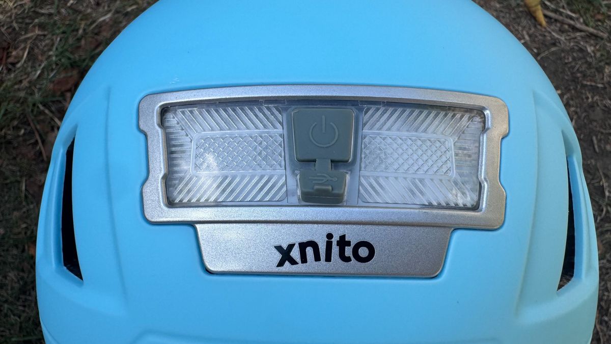 The integrated rear light and USB-C charger on the Xnito Kid helmet