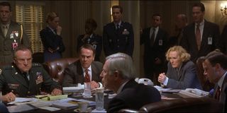 The cabinet discussing plans in Air Force One