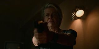 Linda Hamilton holding gun in Terminator: Dark Fate
