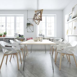 dining room with white wall and chair
