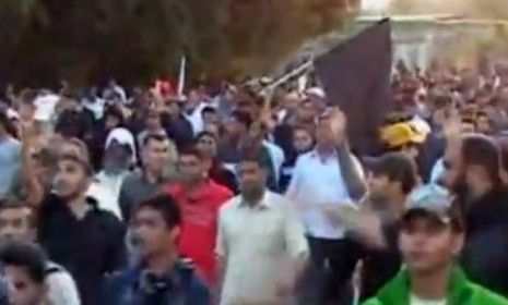 Mourners and protesters march into Bahrain&amp;#039;s Pearl Square moments before police opened fire on the group.