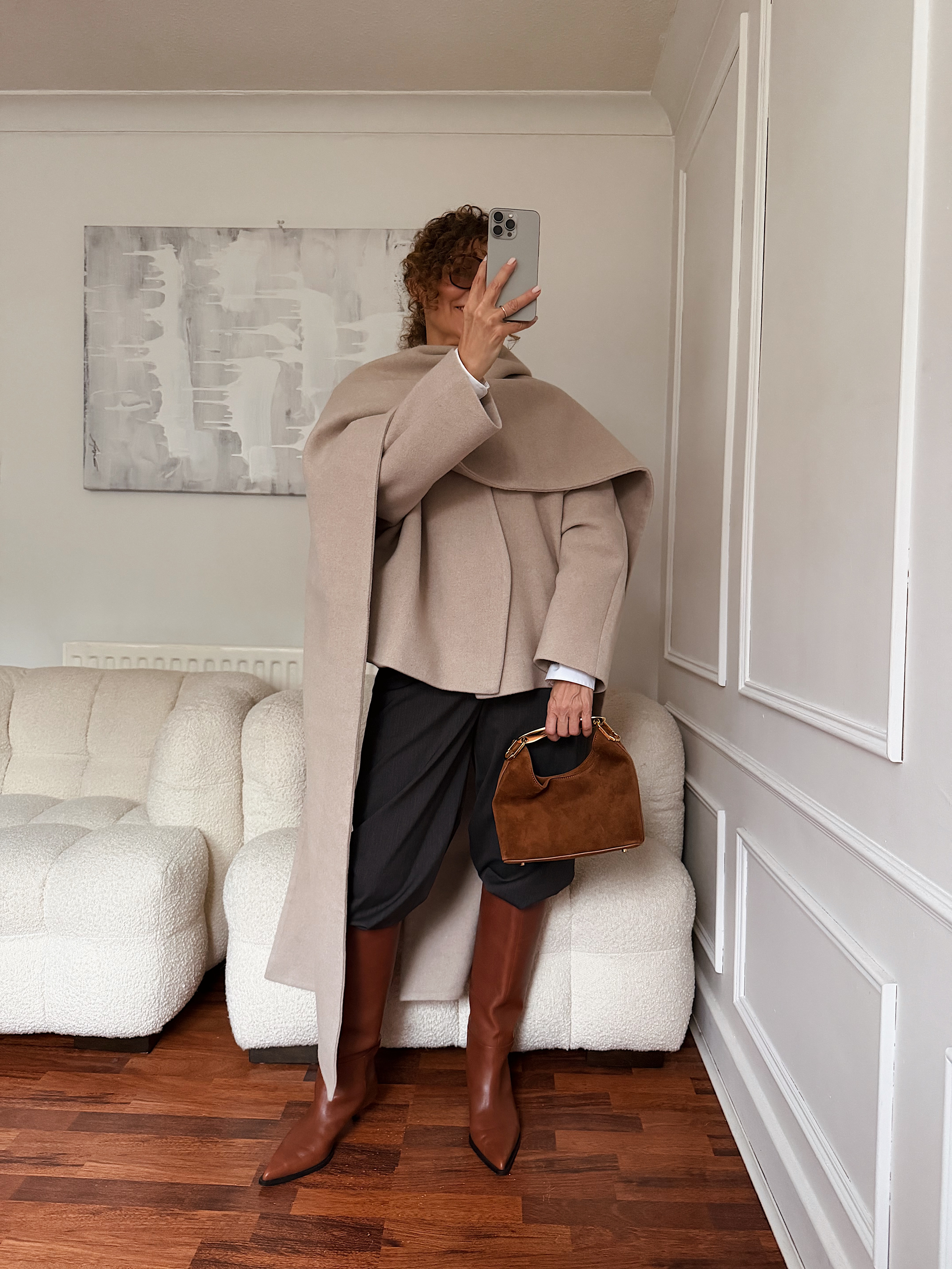 Renia Jazdzyk wearing a scarf coat