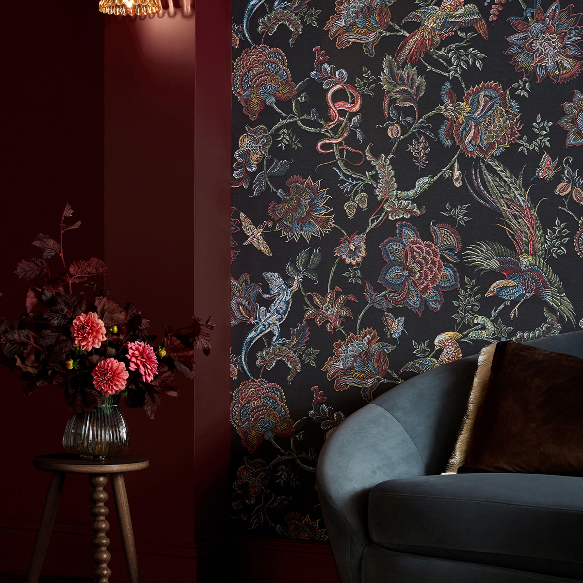 Divine Damson red with the eternal weave wallpaper and wooden side table and vase