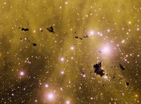 This image was obtained with the wide-field view of the Mosaic II camera on the Blanco 4-meter telescope at Cerro Tololo on Jan 12th and Feb 7th, 2012. An array of dark Bok globules, known as Thackeray's Globules, can be seen in silhouette against the emission nebula IC 2944 in the constellation Centaurus. 