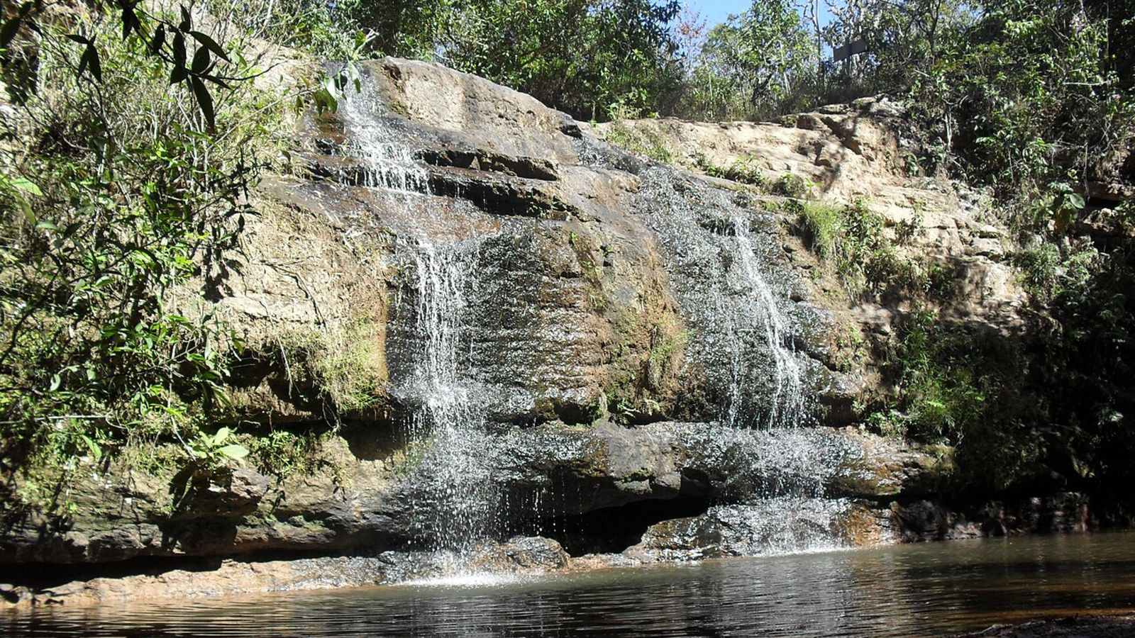 A photo of a waterfall flowing down the side of the dome
