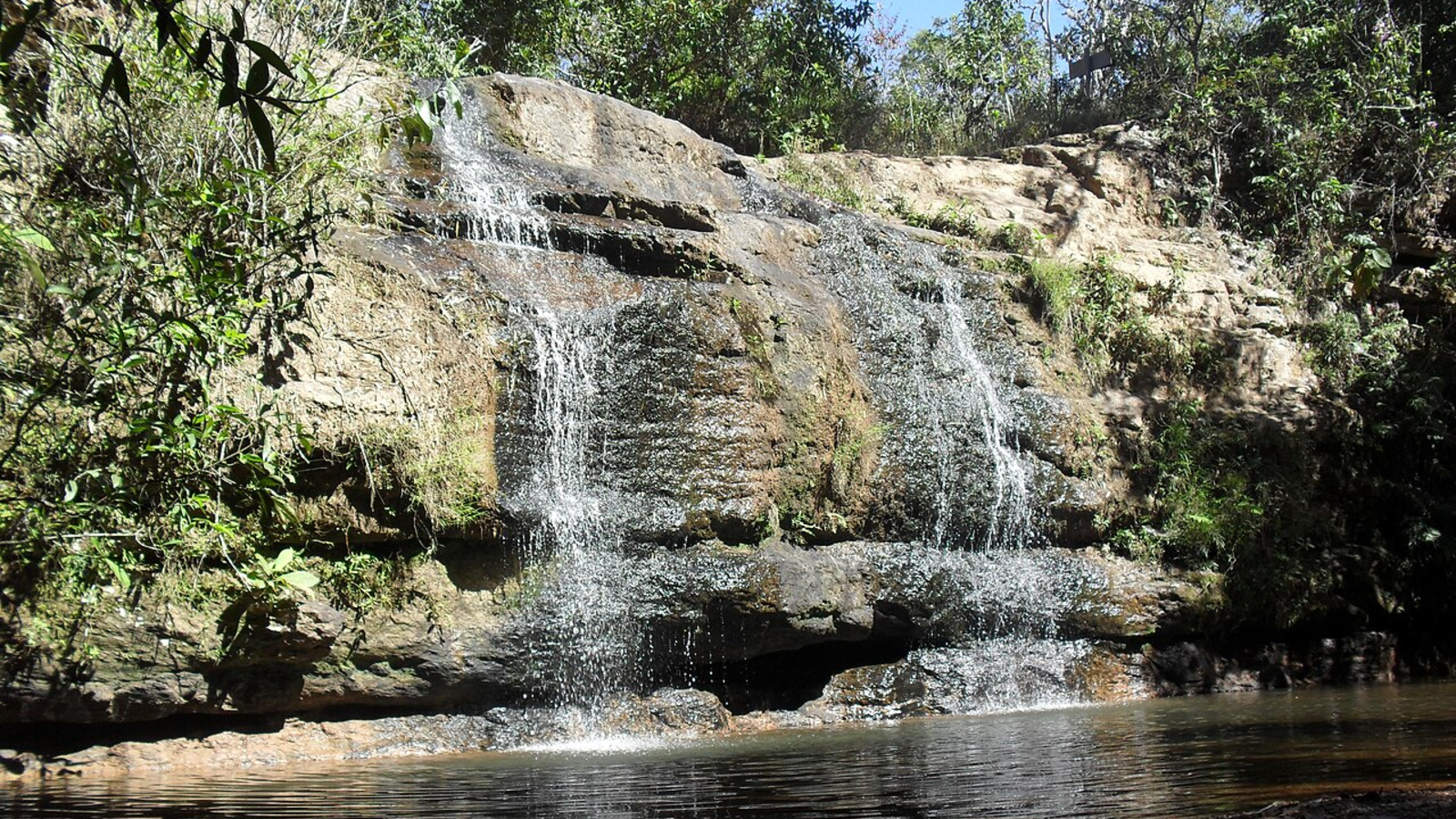 A photo of a waterfall flowing down the side of the dome