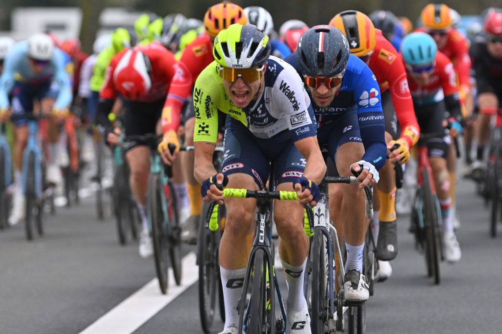 NOKERE BELGIUM MARCH 13 LR Dries De Pooter of Belgium and Team Intermarche Wanty and Marc Sarreau of France and Team Groupama FDJ lead the peloton during the 78th Danilith Nokere Koerse 2024 Mens Elite a 1881km one day race from Deinze to Nokere UCIWT on March 13 2024 in Nokere Belgium Photo by Luc ClaessenGetty Images