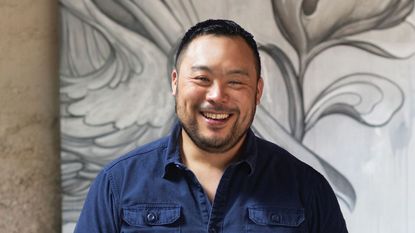 Chef David Chang on a white and gray background