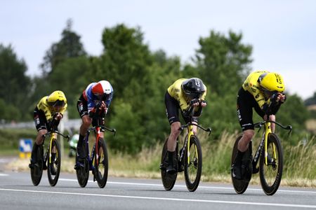 Team Visma | Lease a Bike's team riders cycle during the 3rd stage of the Tour Auvergne-Rhone-Alpes cycling race (formerly known as the Criterium du Dauphine), 28,4km team time trial departing and arriving in Perreux central France, on June 9, 2026. (Photo by Anne-Christine POUJOULAT / AFP via Getty Images)