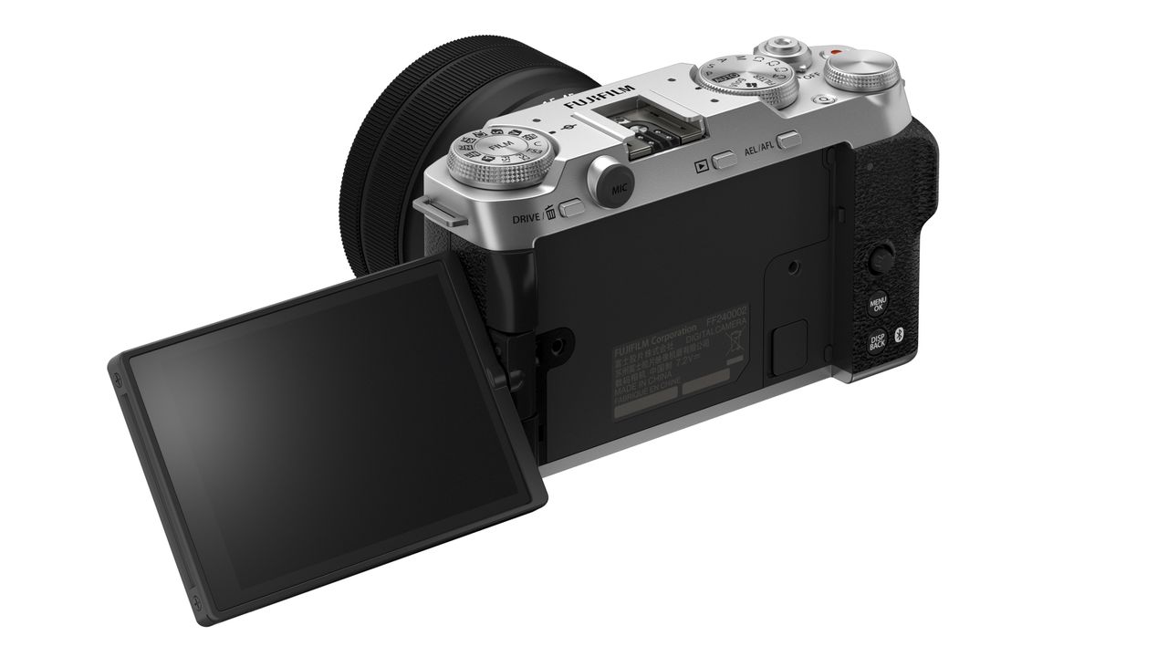 Product shots of a Fujifilm X-M5 digital camera on a white background