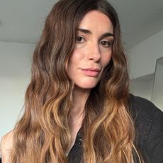 A photo of Eleanor with wavy hairstyle