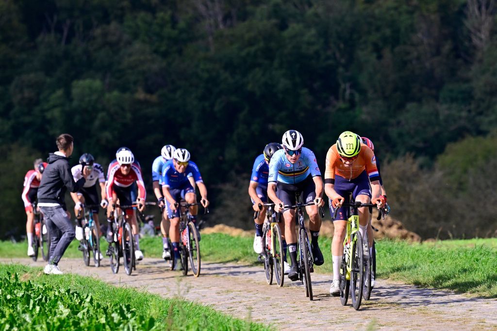 The pack of riders pictured in action during the road race U23 Men at the European Championship 2024, in Hasselt, Friday 13 September 2024. The UEC Road European Championships 2024 will take place from 11 to 15 september in Limburg, Belgium. BELGA PHOTO DIRK WAEM (Photo by DIRK WAEM / BELGA MAG / Belga via AFP)