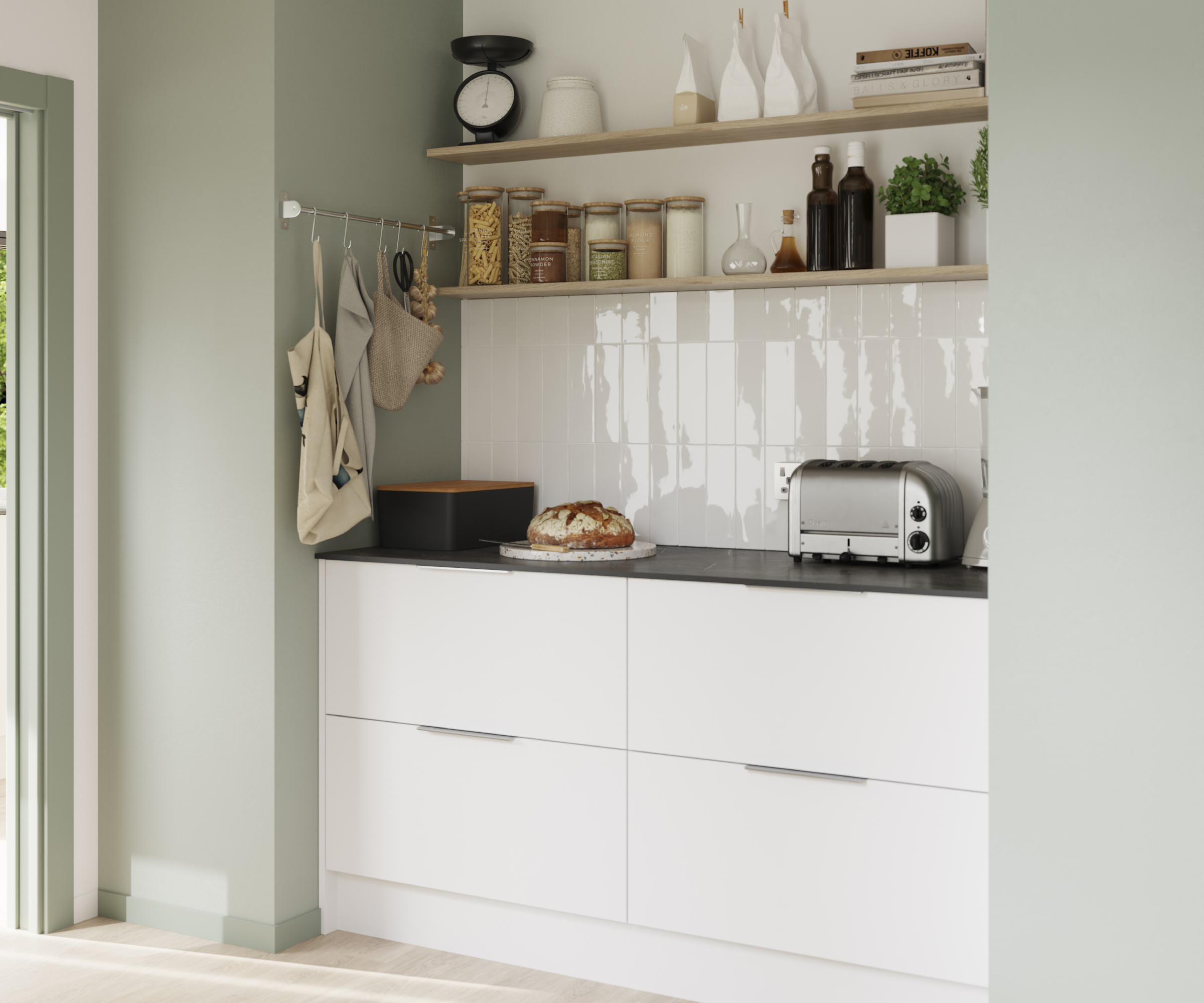 white kitchen cabinets with white tiled splashback and green walls to either side