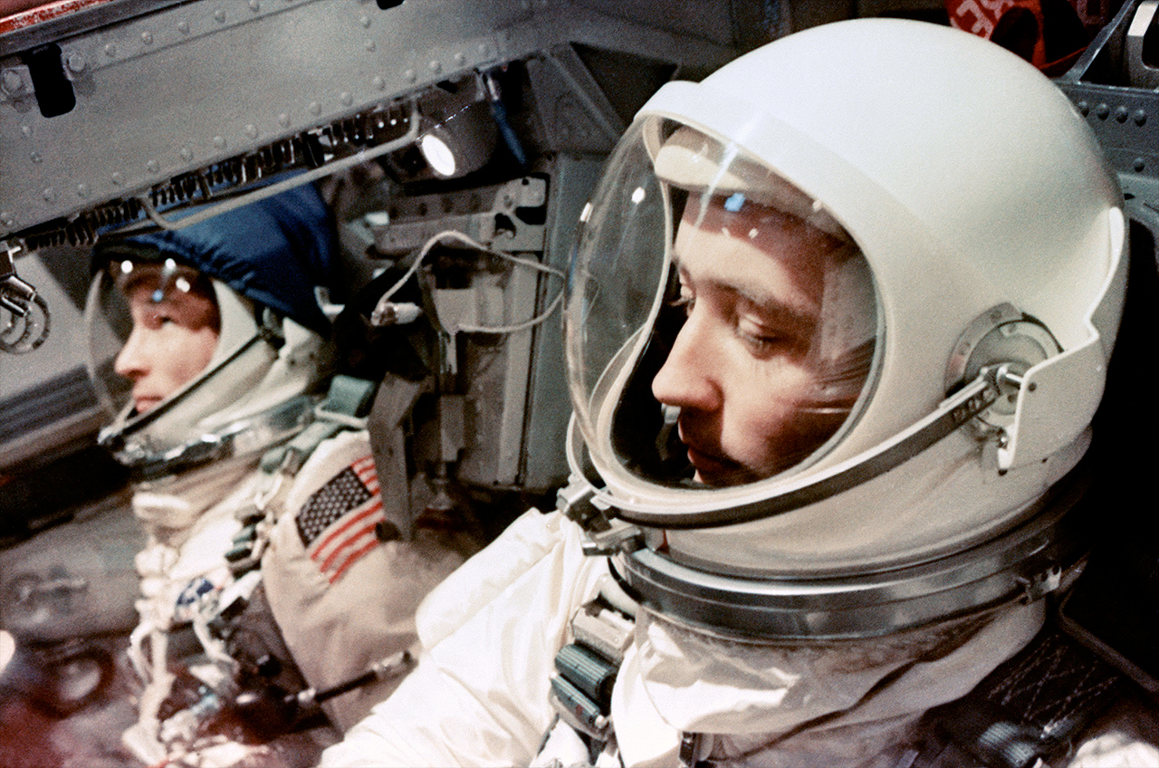 Jim McDivitt, seated to the right of Ed White, awaits their launch on board the Gemini 4 spacecraft on June 3, 1965.