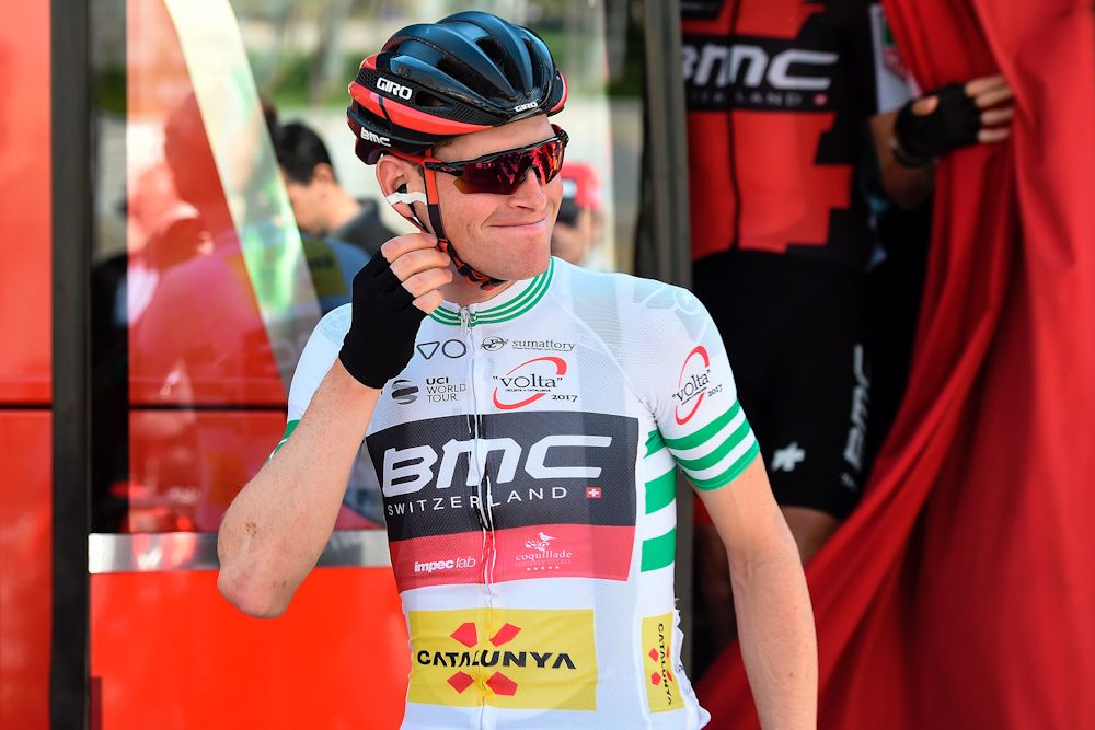BMC's Belgian rider Ben Hermans (R) sports the leader jersey before the start of the third stage of the 97th Volta Catalunya