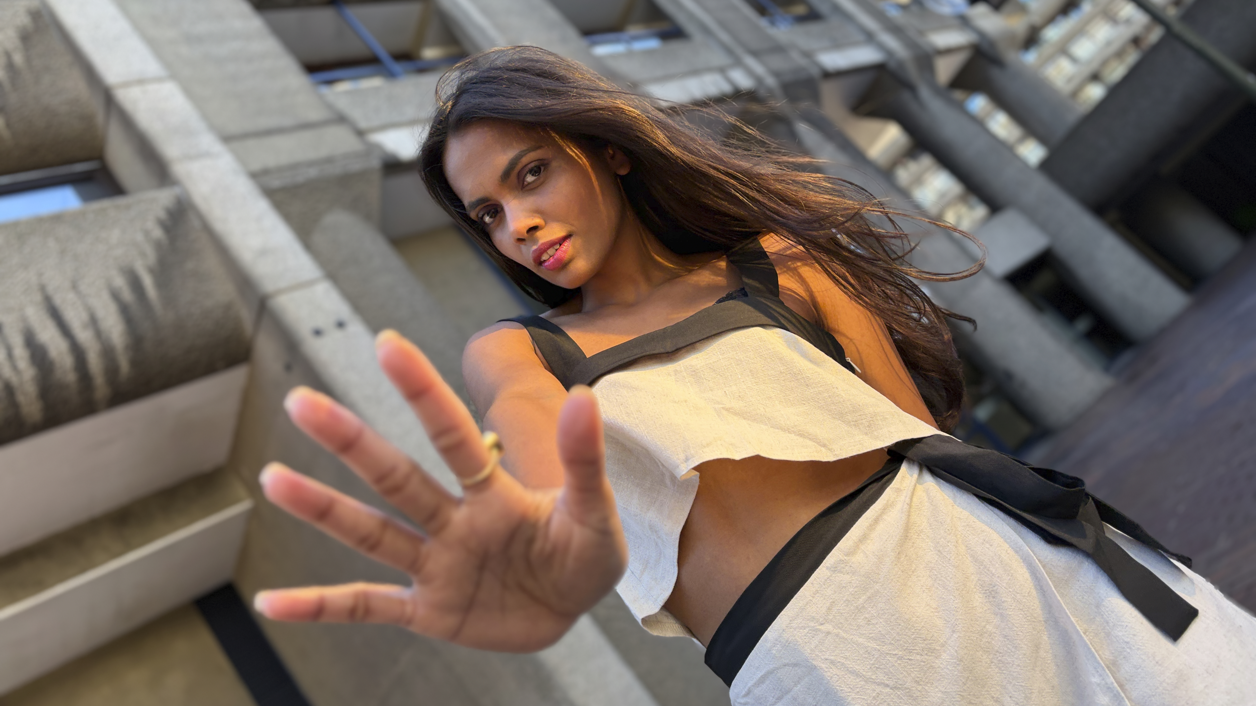 Shot 2 of 2: The second shot is the resulting portrait, with the model appearing to be lit from the side by a low-angle golden-hour sun.